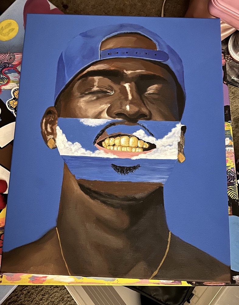 Portrait painting with a backward blue cap and gold teeth inside a strip of clouds and ocean