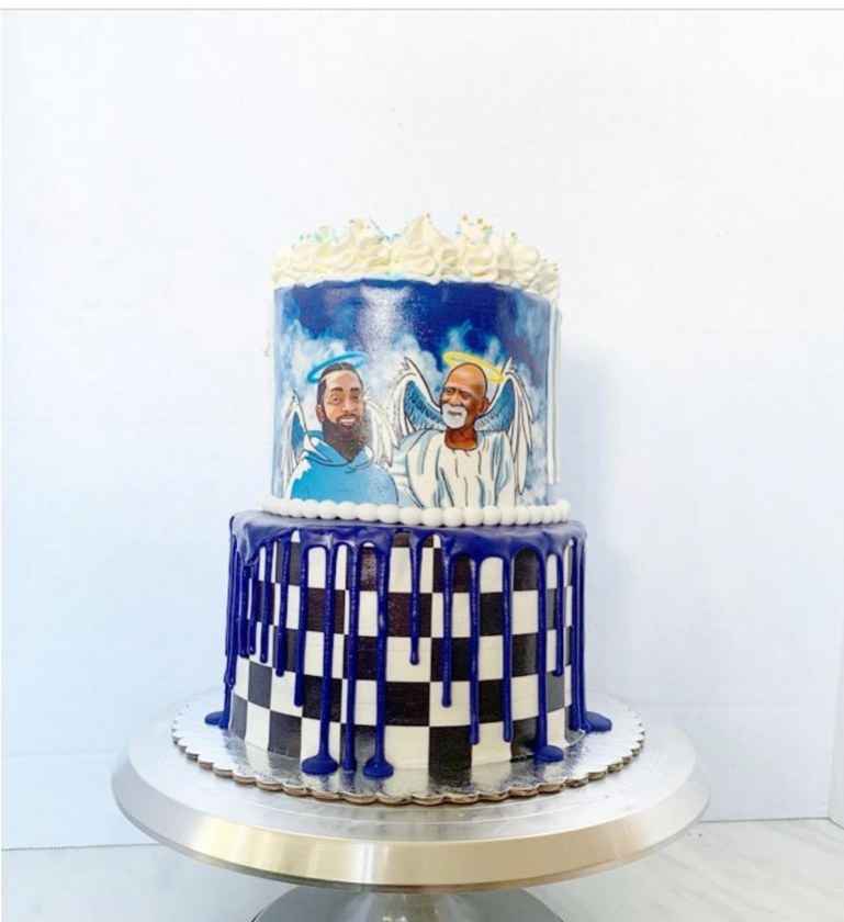 Finished blue and white cake with Nipsey Hussle and Dr. Sebi artwork created by Nika B