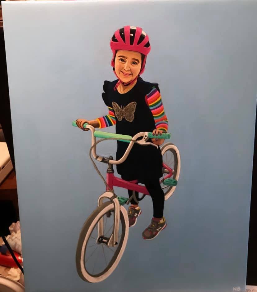 Painted portrait of a young cyclist wearing a red helmet
